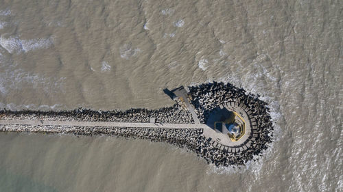 High angle view of stone on beach