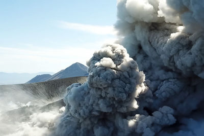 Panoramic view of volcanic mountain against sky