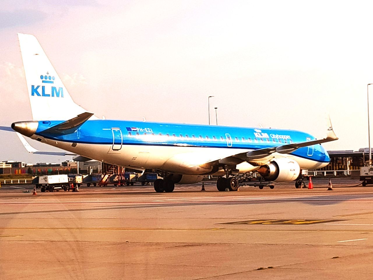 airplane, transportation, airport, air vehicle, travel, airport runway, mode of transport, day, runway, outdoors, no people, commercial airplane, sky, airplane wing