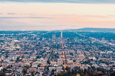 High angle view of townscape against sky during sunset