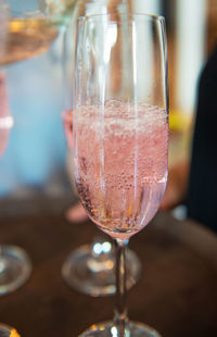 Close-up of wine in glass on table