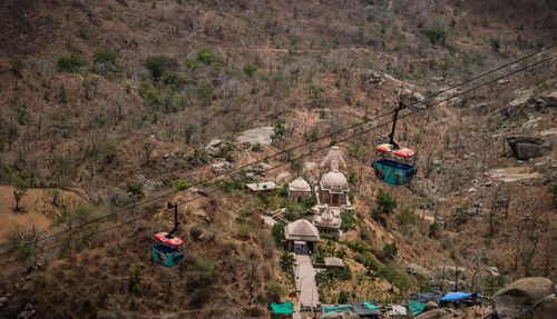 High angle view of people on land against mountains