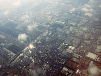 High angle view of illuminated buildings in city