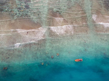 Aerial view of boat moored on sea