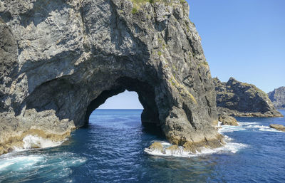 Sunny scenery showing a rock gate at the bay of islands