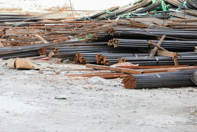 Stack of firewood at construction site in forest