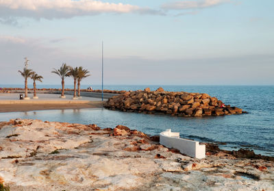 Scenic view of beach against sky