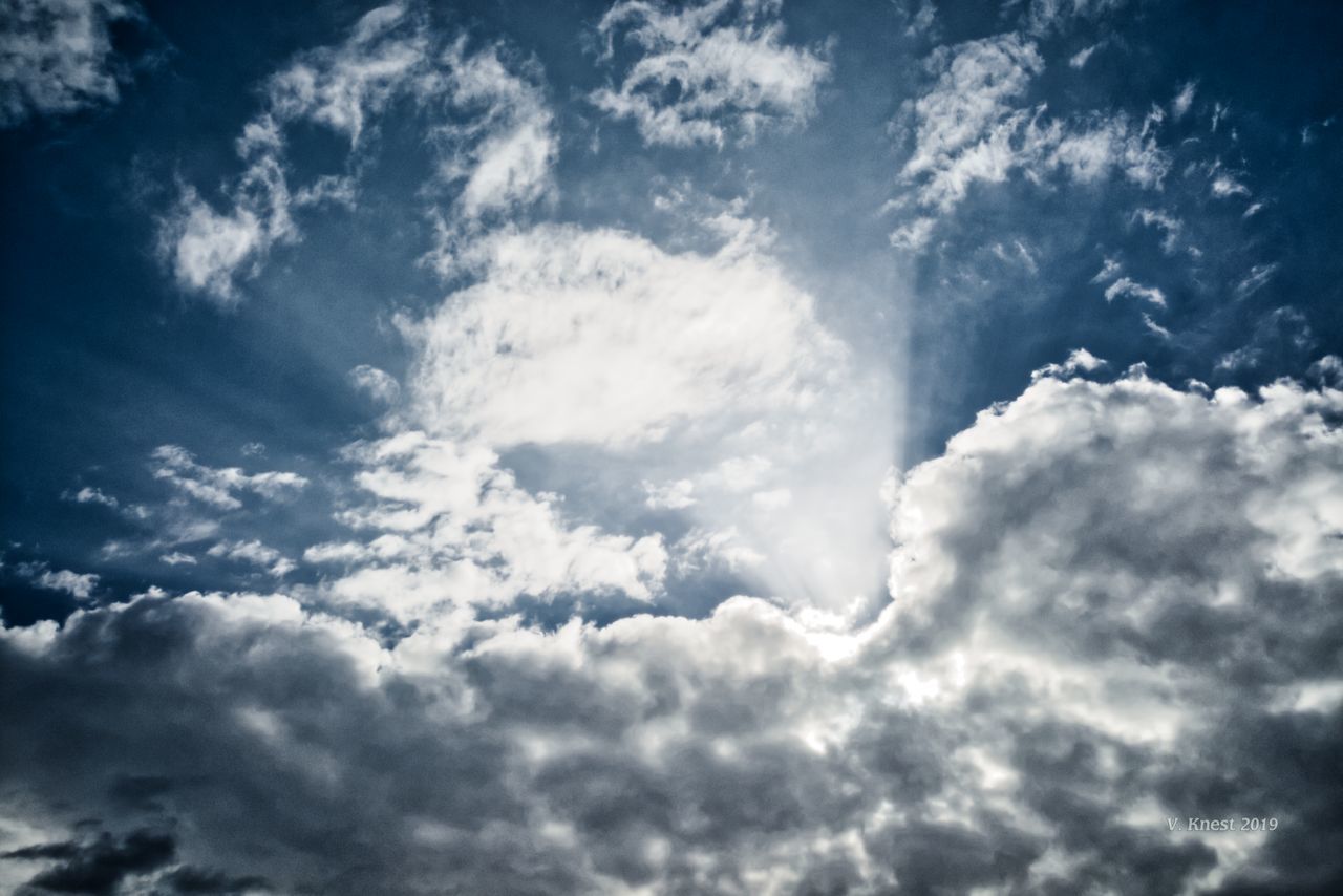 cloud - sky, sky, beauty in nature, low angle view, scenics - nature, tranquility, nature, no people, tranquil scene, day, outdoors, backgrounds, blue, cloudscape, sunlight, idyllic, white color, dramatic sky, majestic, meteorology, softness