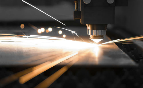 Close-up of fiber laser cutting metal