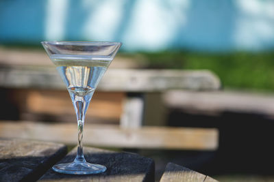 Close-up of champagne coupe on table