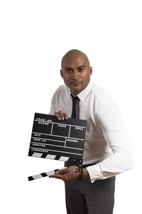 Portrait of man standing against white background