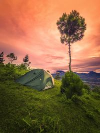 Scenic view of landscape against sky during sunset