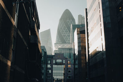 Low angle view of skyscrapers against sky