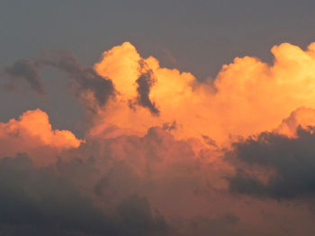 Low angle view of cloudy sky at sunset