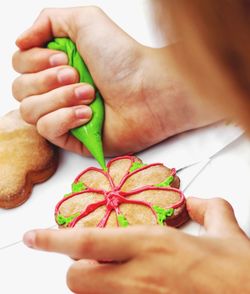 Midsection of woman holding leaves