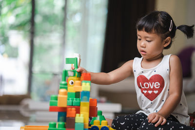 Girl playing with toy