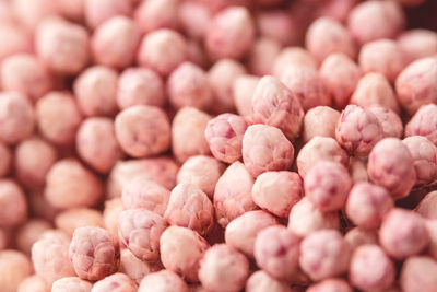 Many small pink flowers in macro. soft focus. beautiful background or backdrop for invitation cards