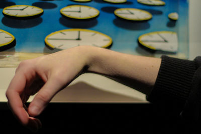 Low section of person reading book