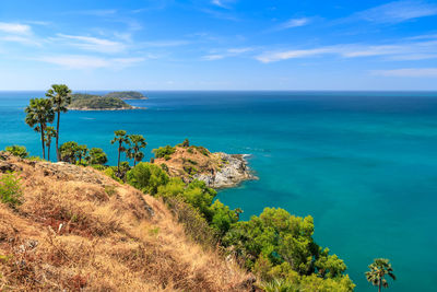 Scenic view of sea against blue sky