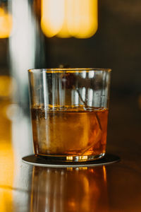 Close-up of alcohol in glass on table