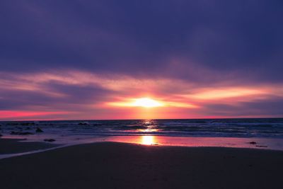 Scenic view of beach during sunset