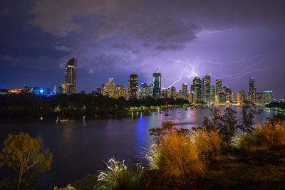 Lightning over city at night