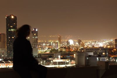 Illuminated cityscape at night