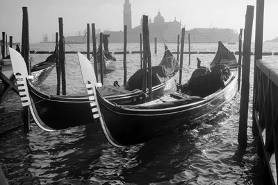 Boats moored in sea