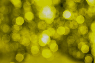 Abstract hexagonal bokeh background with a beautiful yellow color