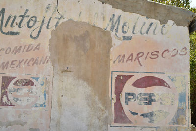 Close-up of graffiti on wall