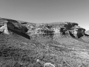 Scenic view of snowy landscape against clear sky