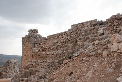 Low angle view of fort against sky