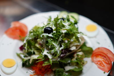 Close-up of breakfast served on plate