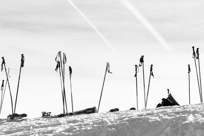 Low angle view of snow covered land against sky