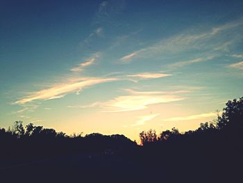 Scenic view of landscape at sunset