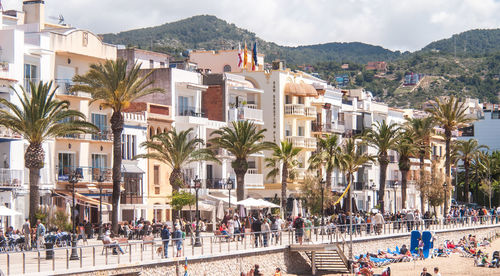 Group of people in front of buildings