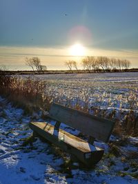 Scenic view of field against sky during sunset