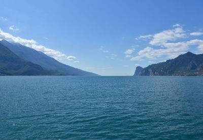 Scenic view of sea against blue sky