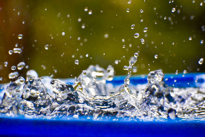 Close-up of water falling from ice