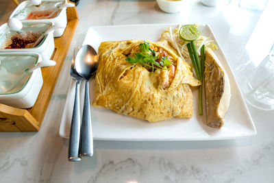 High angle view of breakfast served on table