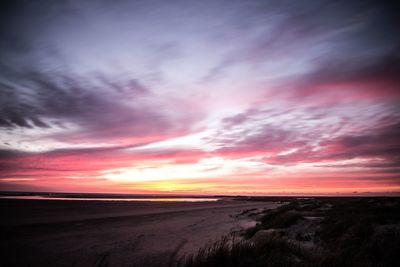 Scenic view of dramatic sky during sunset