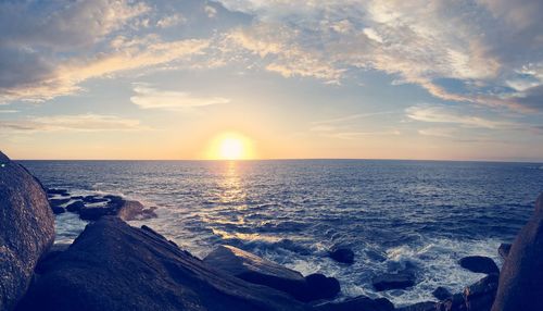 Scenic view of sea against sky during sunset