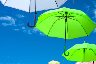 Low angle view of umbrella against sky