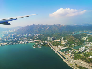 Aerial view of cityscape against sky