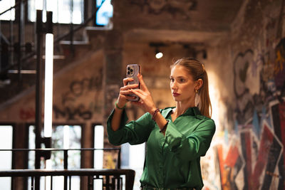 Young woman using mobile phone