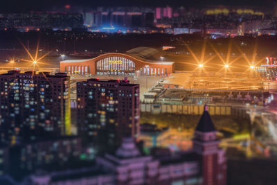 Illuminated buildings in city at night