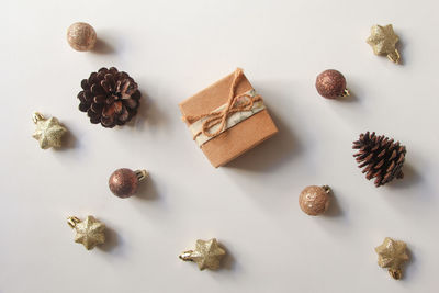 Close-up of christmas decorations on white background