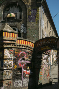 Low angle view of graffiti on building wall