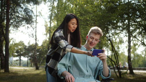 Portrait of woman using mobile phone