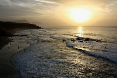 Scenic view of sea against sky during sunset